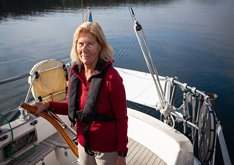 Woman learning to sail a yacht